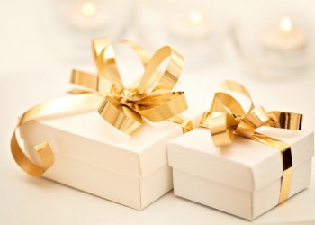 gift boxes with golden ribbon bow; Shutterstock ID 90407911; PO: aol; Job: production; Client: drone